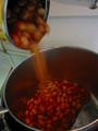  pouring beans into pot 