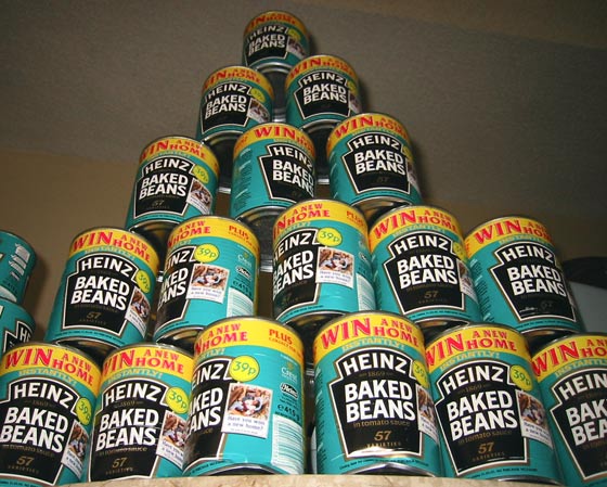 a stack of heinz baked beans cans 