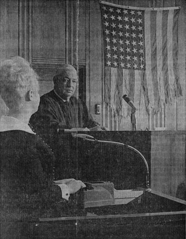 Tattered American flag of LCI 1074 displayed in December 1969 in courtroom of Judge R. G. Harvey